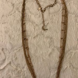 NY & Company gold tone necklace.Long